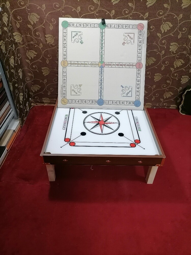 طاولات كيرم وسجن والثعبان - 1