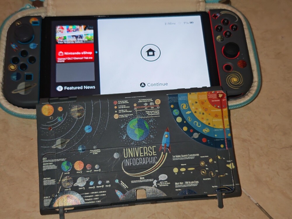 Nintendo Switch OLED 64 GB +4 GAMES - 3