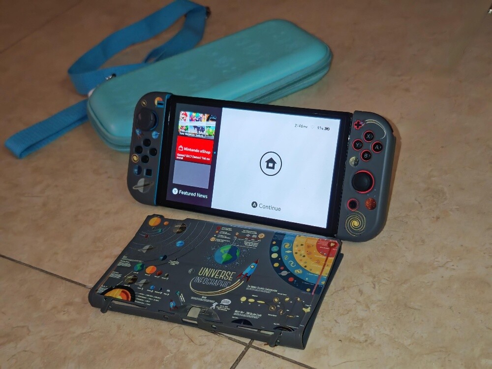Nintendo Switch OLED 64 GB +4 GAMES - 1