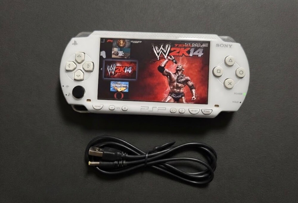sony psp with 30 games - 1