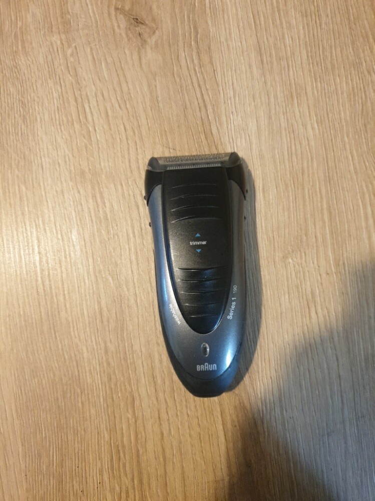 A Philips hair clipper and a Braun - 7