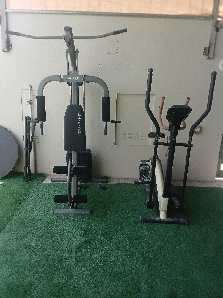 جهاز رفع اثقال مع عجلة رياضية - 1