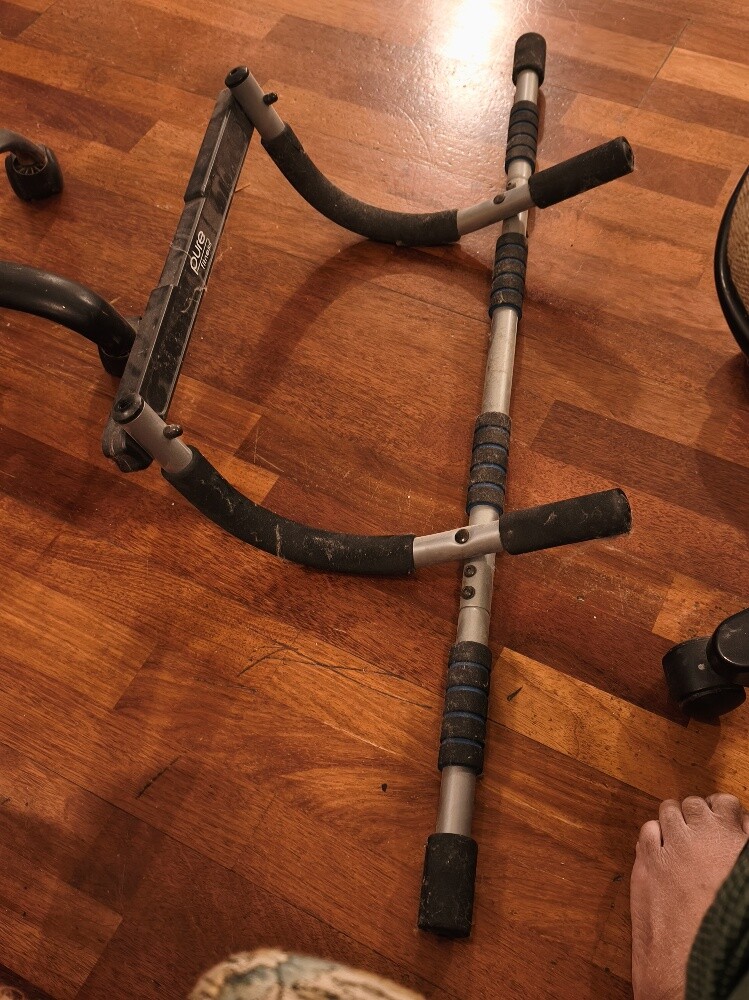 Door frame fit stretch bar - 2