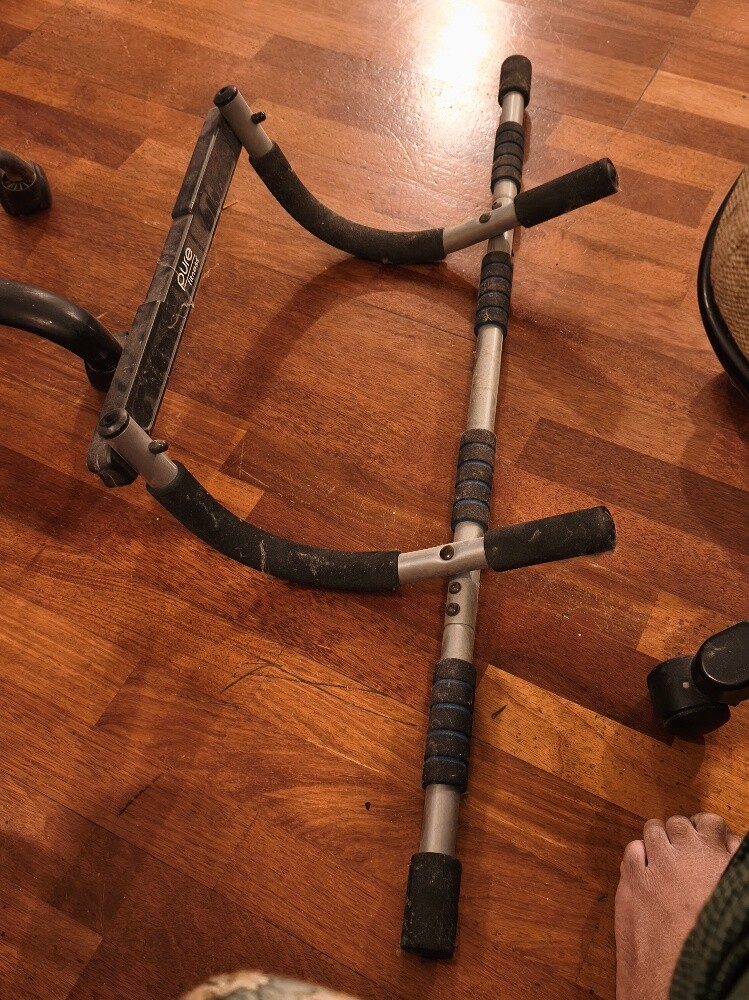 Door frame fit stretch bar - 1