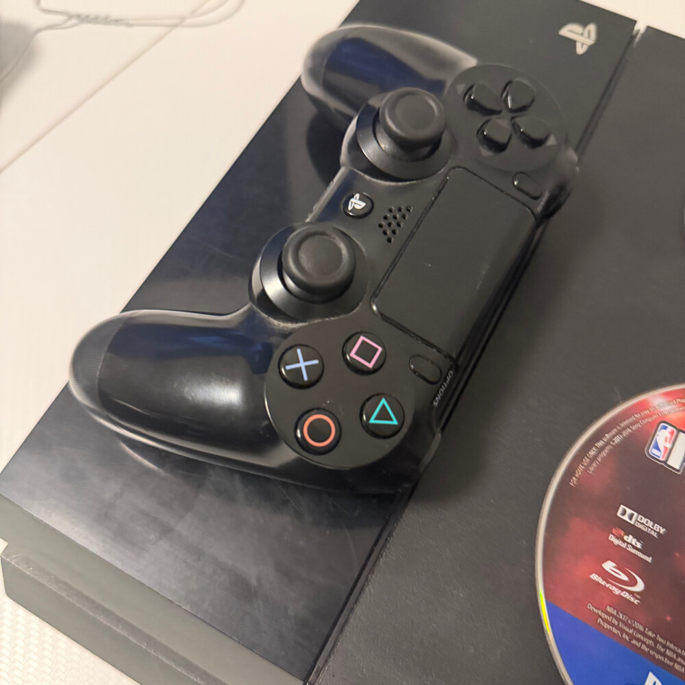 ps4 and controller with games - 6