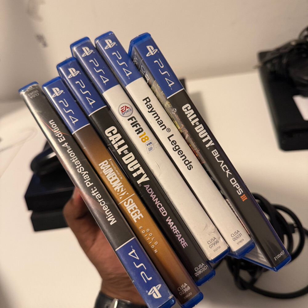 ps4 and controller with games - 4
