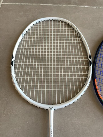 three badminton rackets  - 2