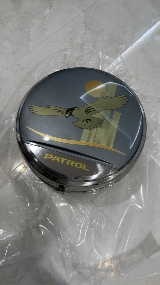 nissan spare cover  - 1