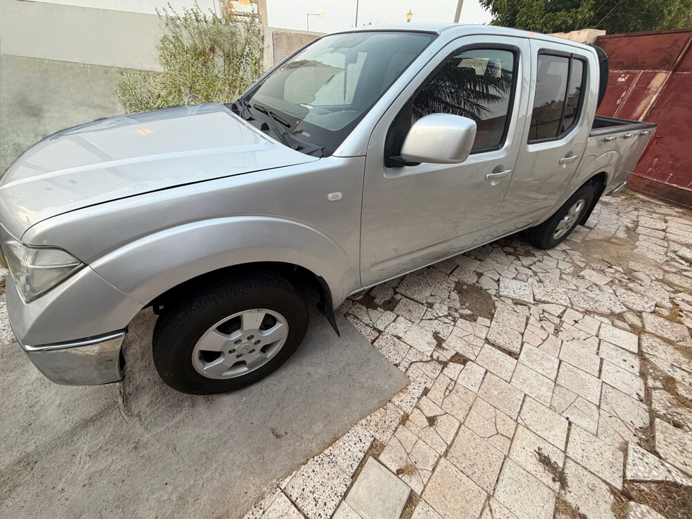 For Sale: Well-Maintained Nissan - 2