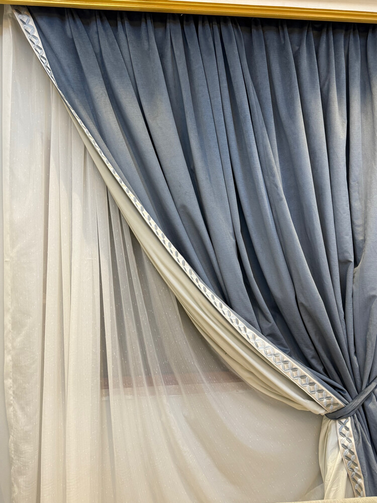 2 chairs and a blue curtain - 2