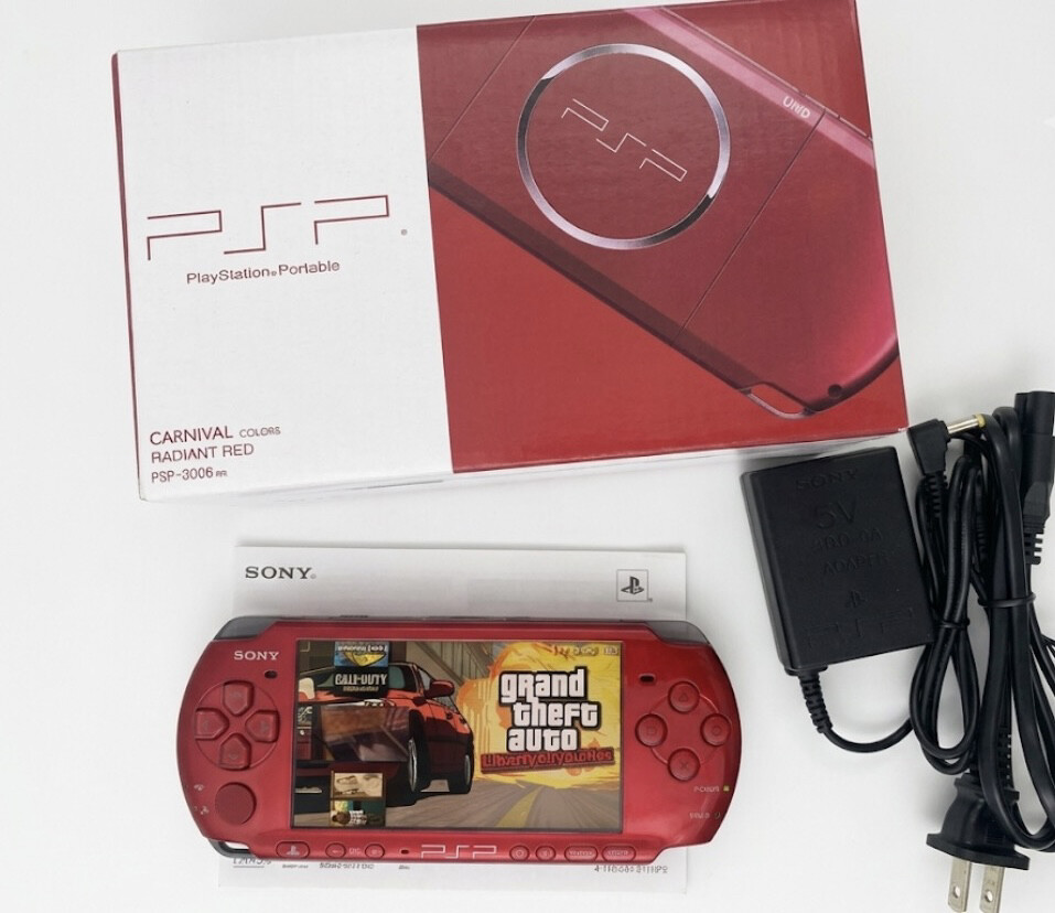 Sony psp with box and games - 1