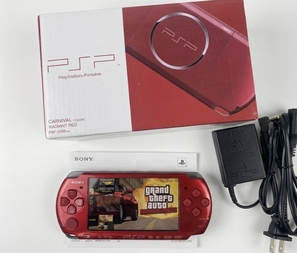 Sony psp with box and games - 3
