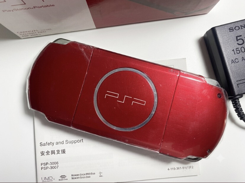 Sony psp with box and games - 2