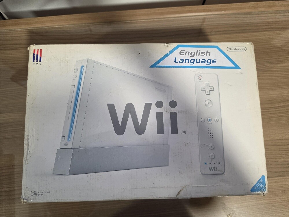 nintendo wii with box with games - 1