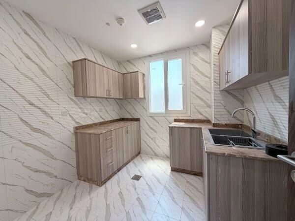 NEW 2BR APARTMENT | MADINAT KHALIFA - 12