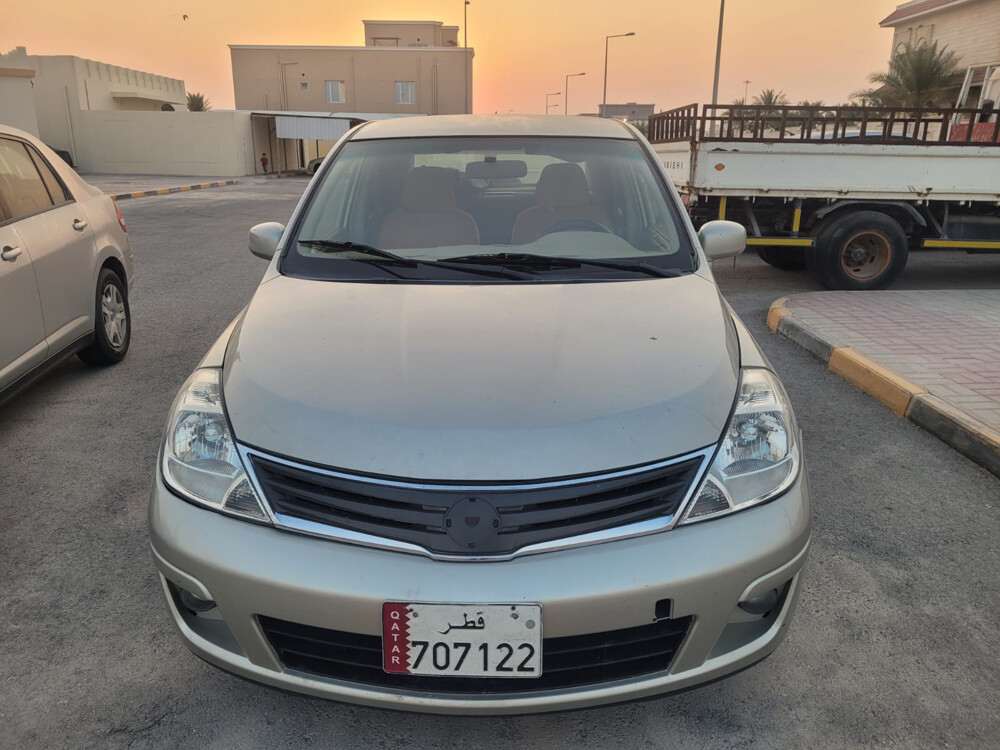 nissan tida - 6