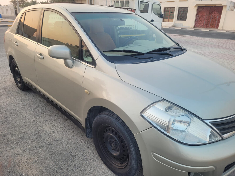 nissan tida - 5