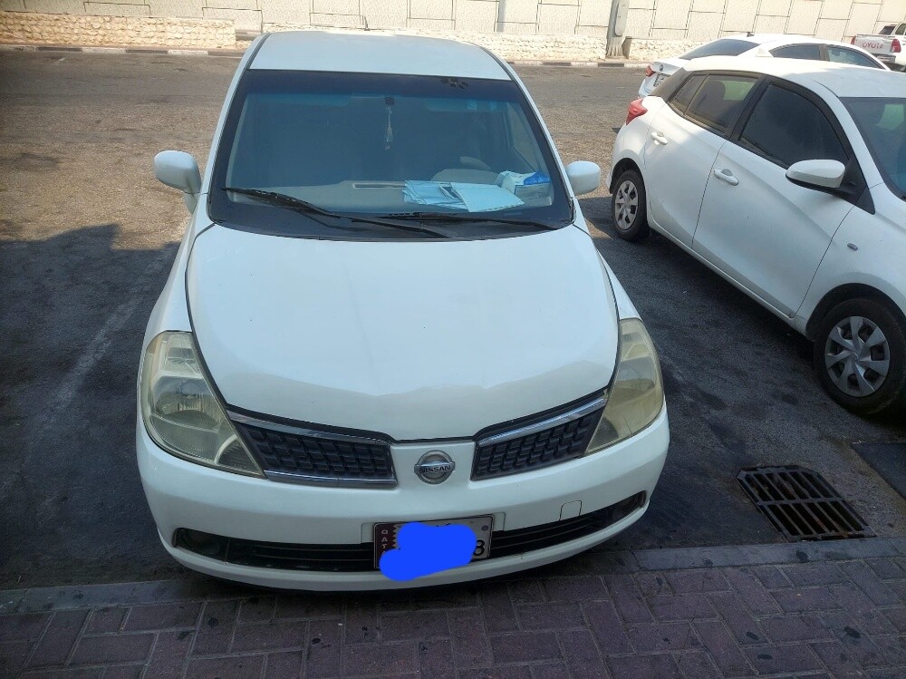Nissan  tida. - 4