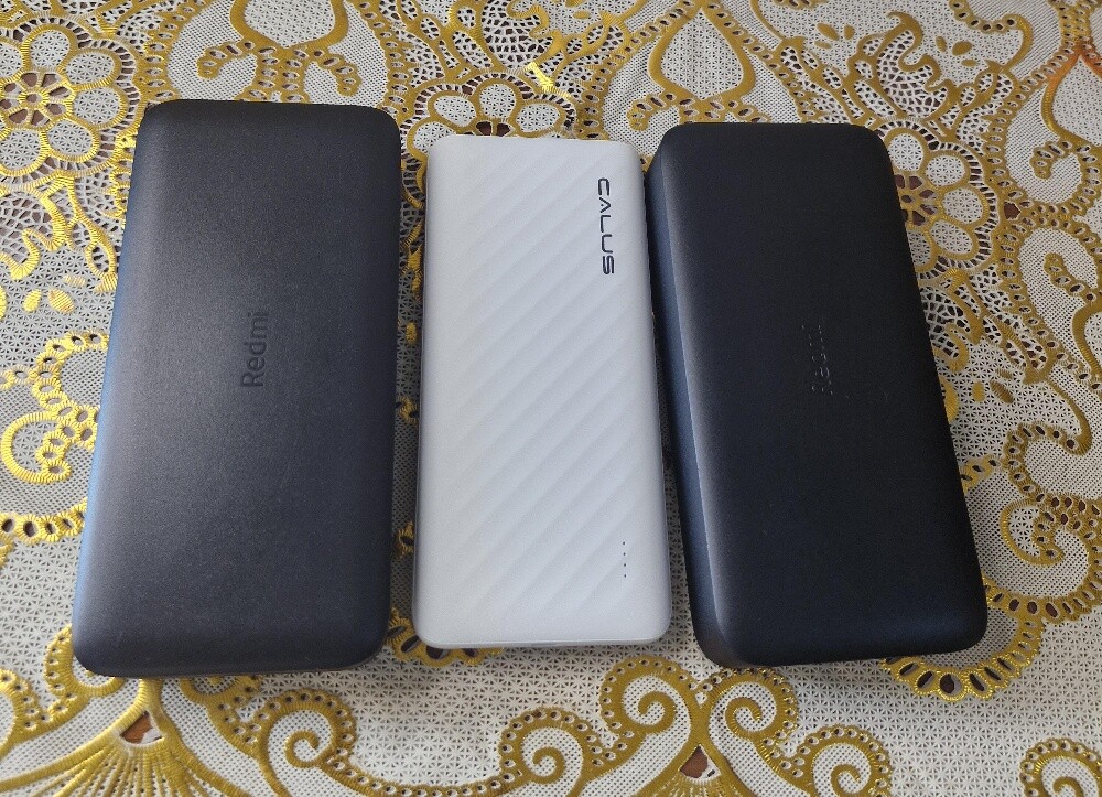 Two Redmi Power bank and Calus new - 1
