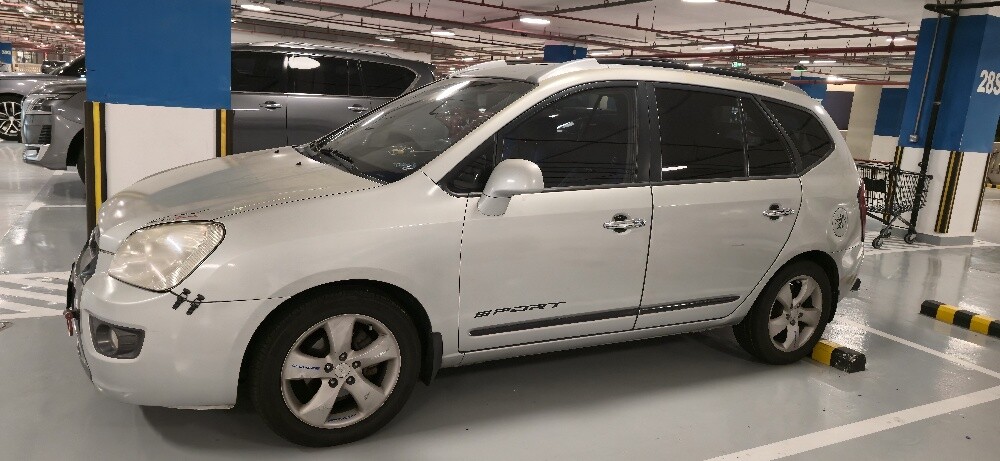 Kia Carens - 4