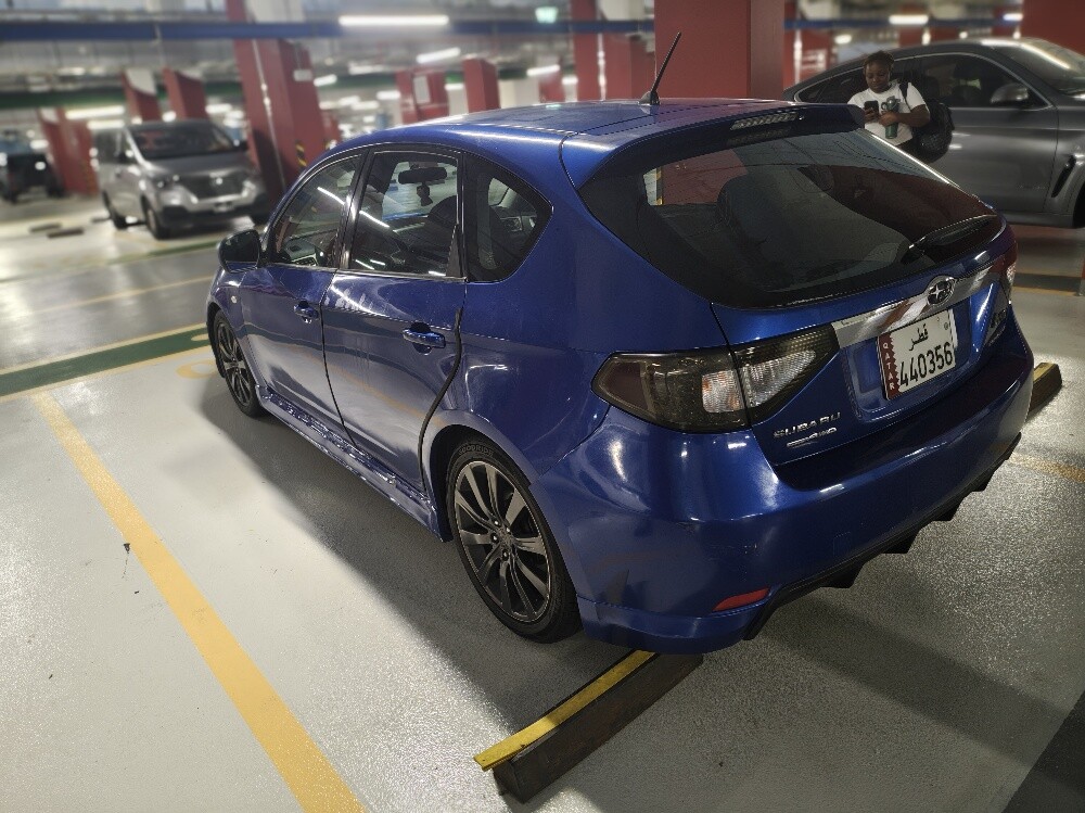 Subaru Impreza 2.0L - 6