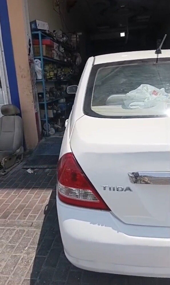 Nissan tida 2009 - 5