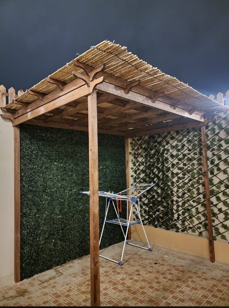 Outdoor wooden pergola work - 2