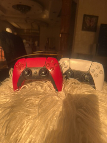 2 PlayStation controllers - 1