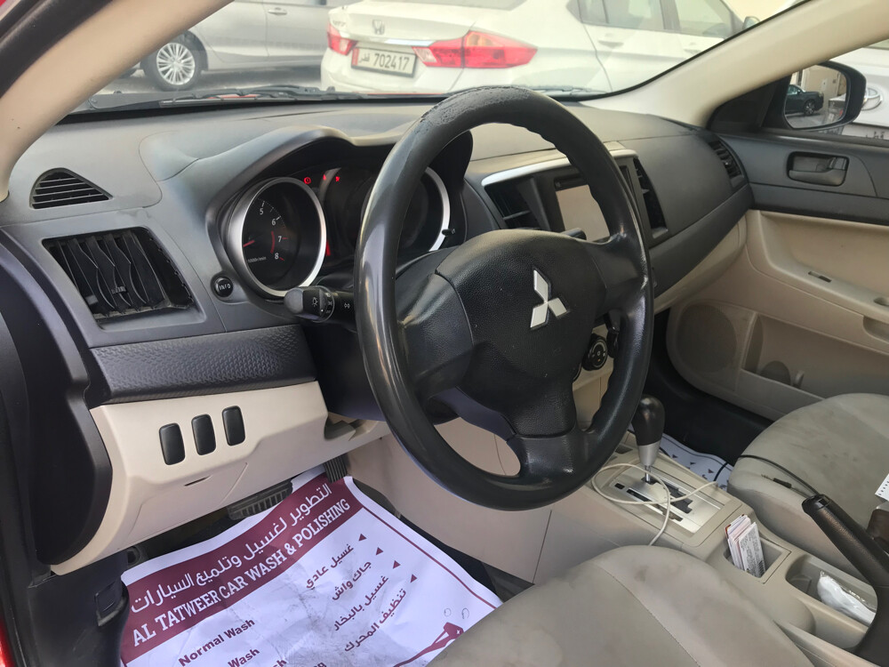 لانسر 2015 لون عنابي  - 10