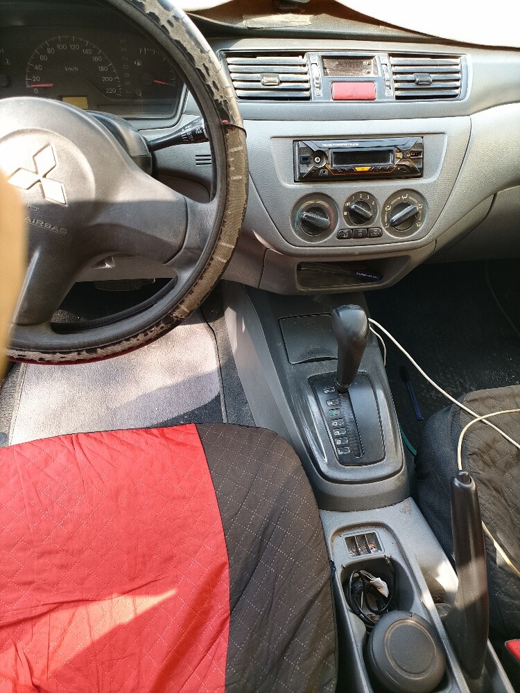 سياره متسوبيشي لانسر 70692725 - 8