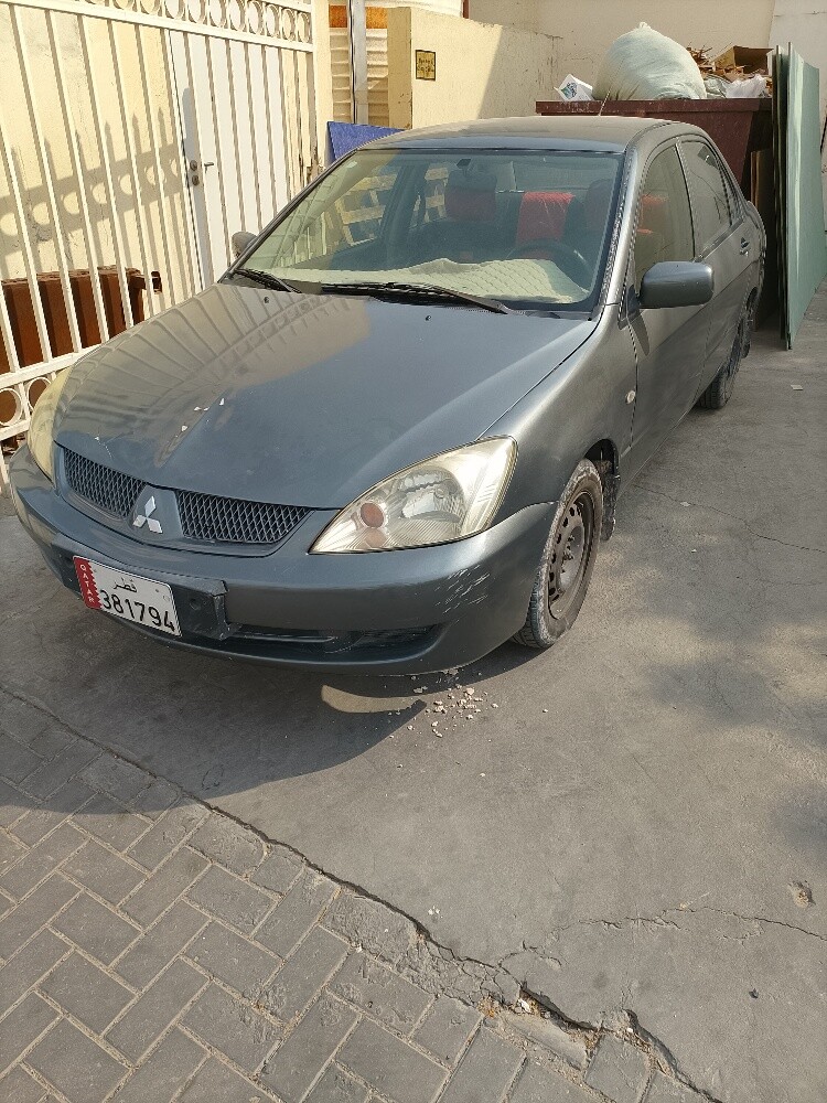 سياره متسوبيشي لانسر 70692725 - 9