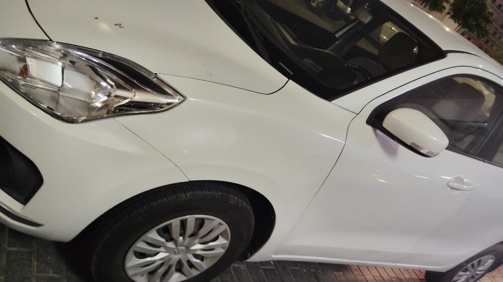 cars good conditions suzki dzire white model 2019 - 2