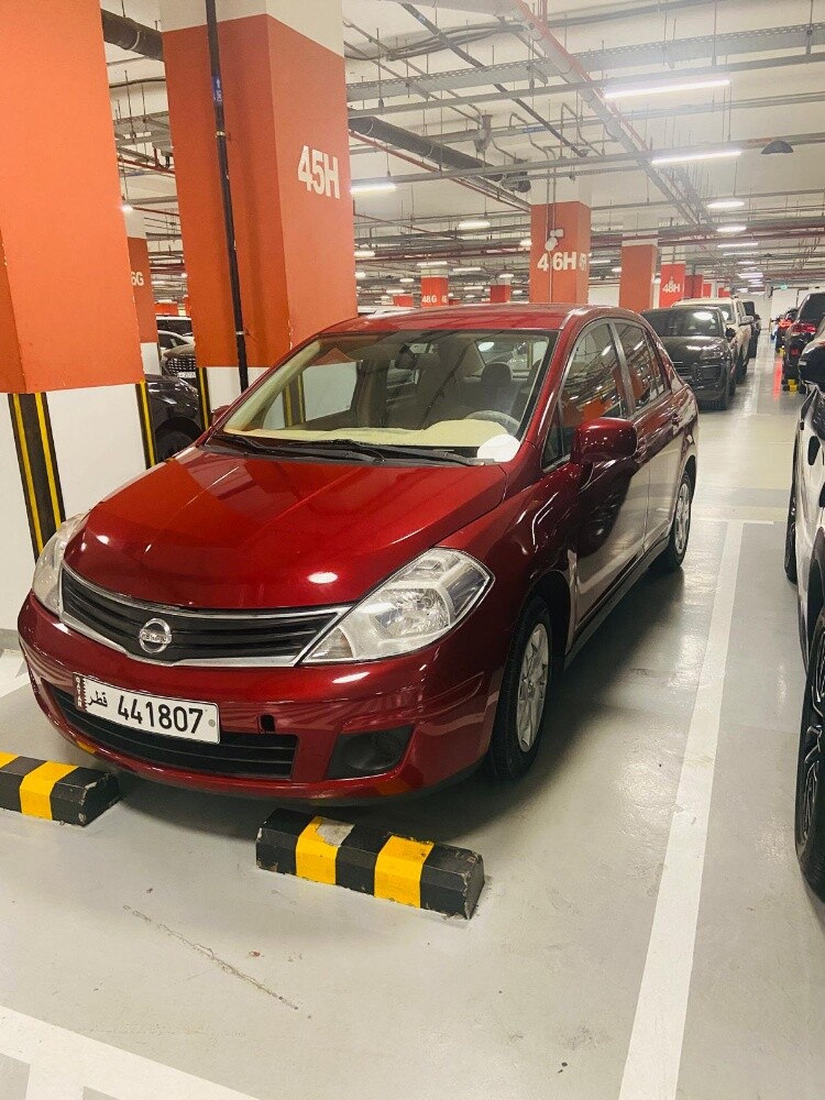 Nissan Tiida 2011 red family used - 3