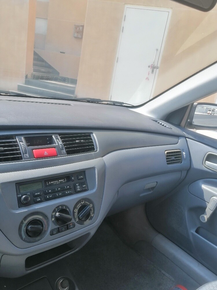 للبيع سيارة لنسر موديل ٢٠٠٢ - 6