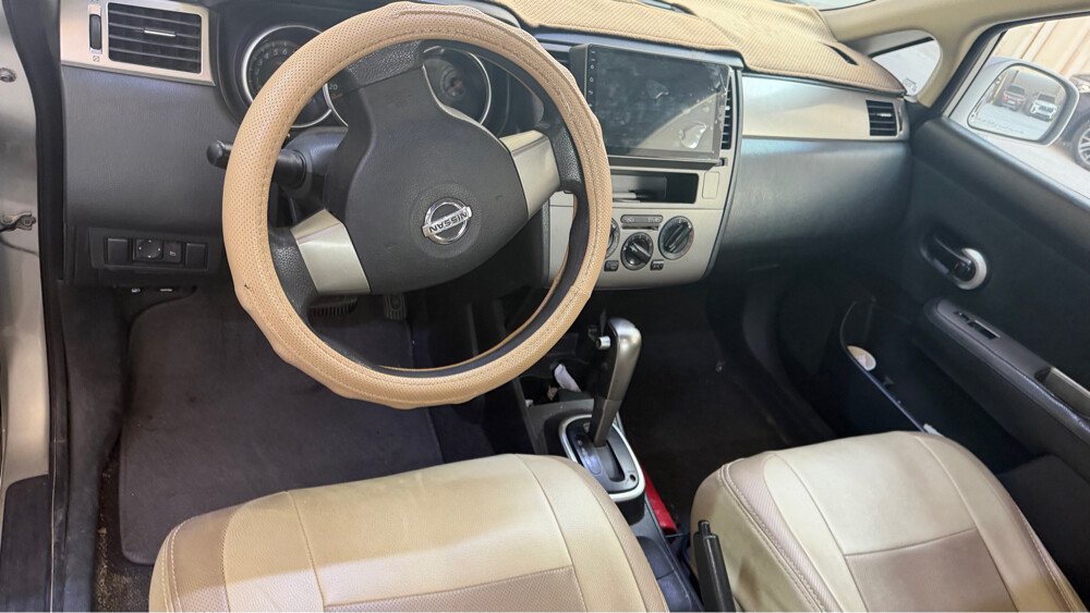 nissan tida - 4