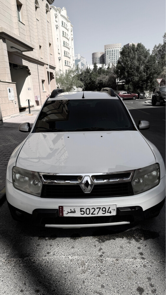 Renault Duster2012–White Family Car - 1