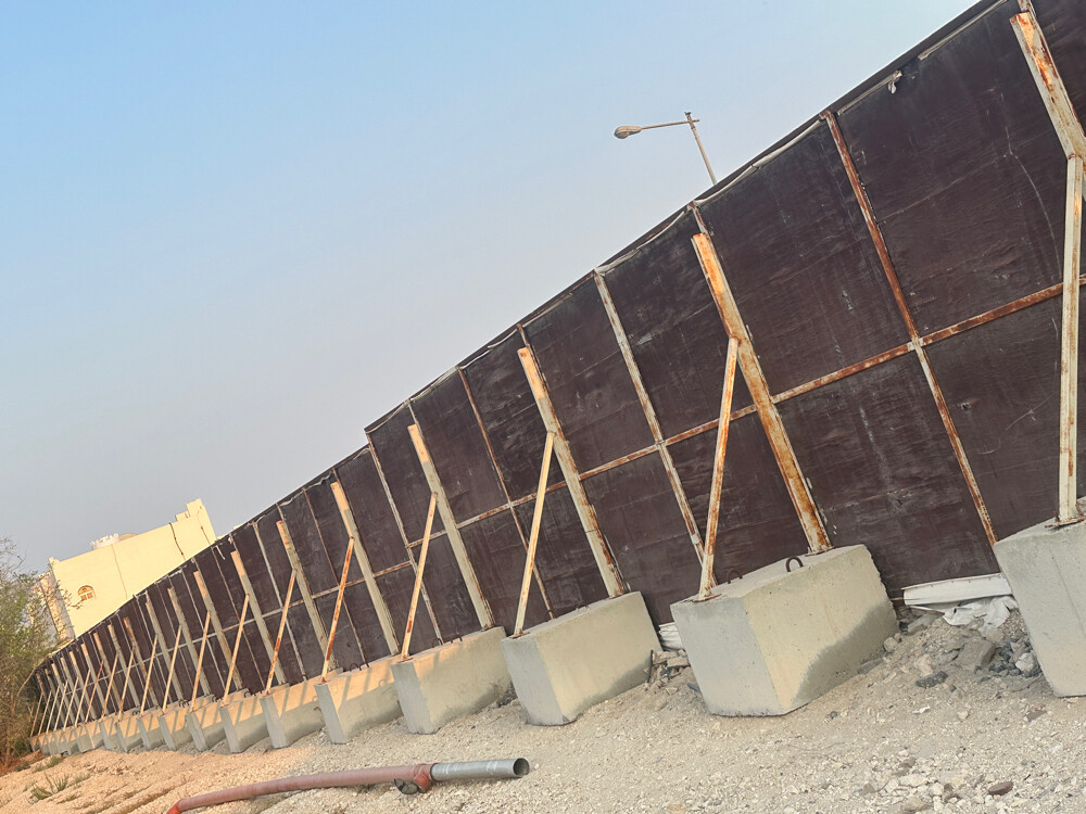 wood fence with concrete block - 1