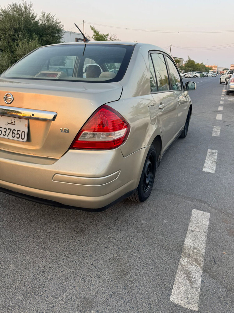 nissan tida 2012 - 4