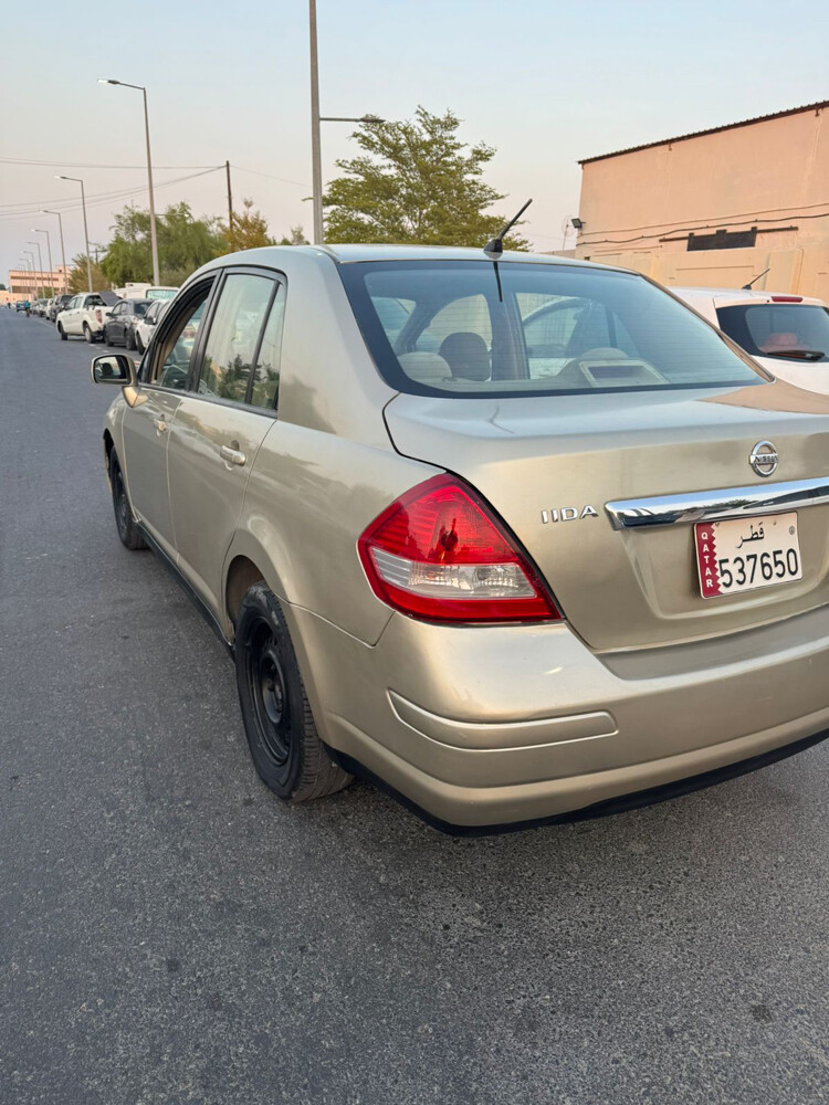 nissan tida 2012 - 2