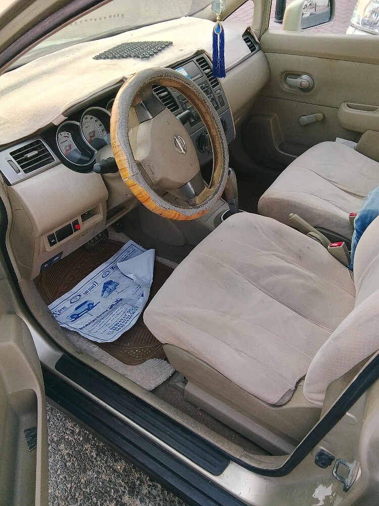 Kia Tiida - 4