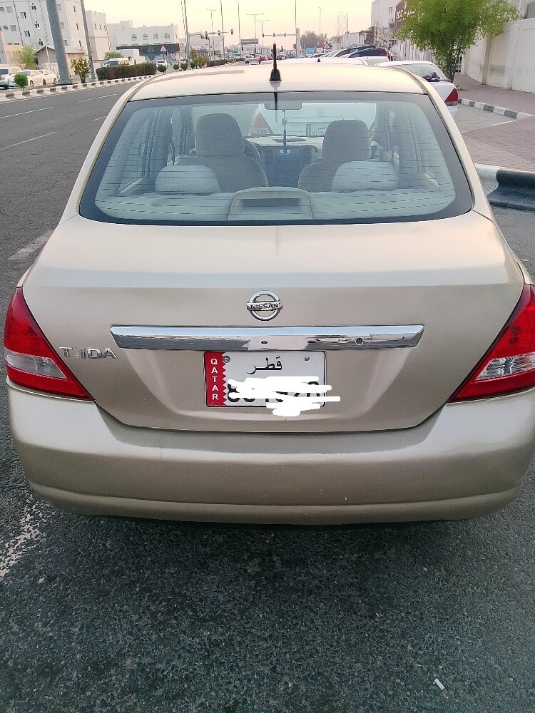 Kia Tiida - 1