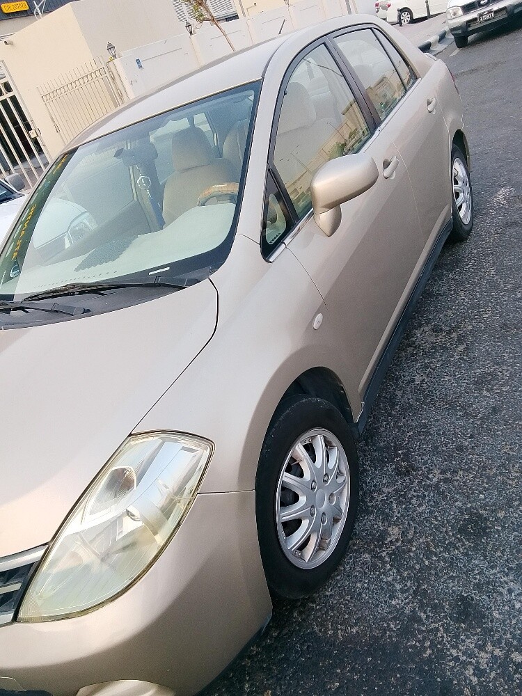 Kia Tiida - 2