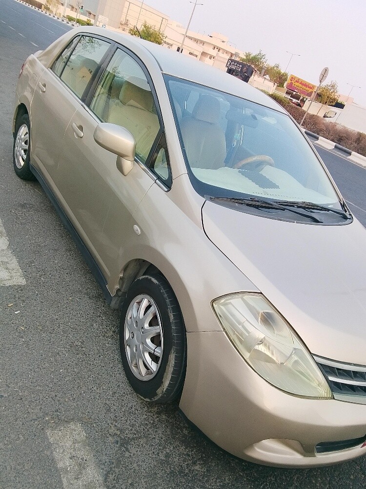 Kia Tiida - 3