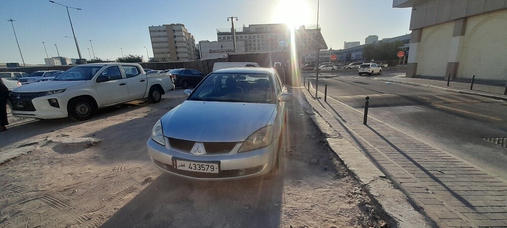 ميتسوبيشي لانسر موديل 2010 - 4