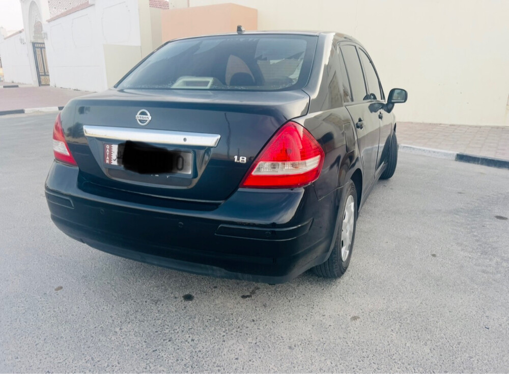 nissan tida - 4