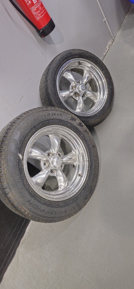 American racing rims with tires set - 1