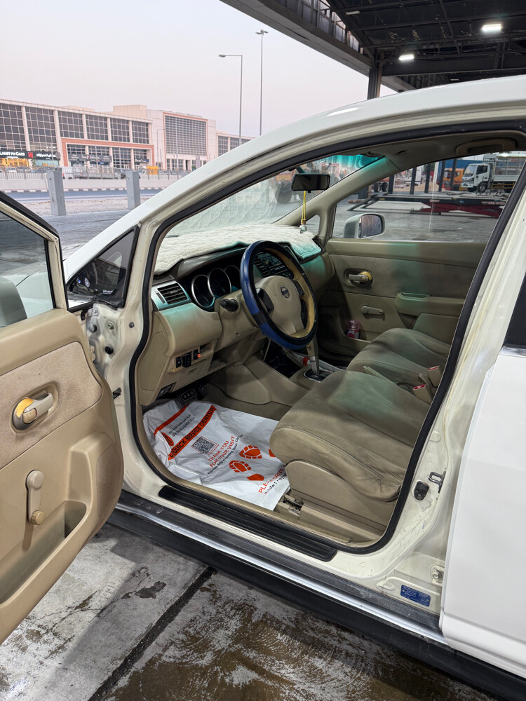 Nissan tida - 5