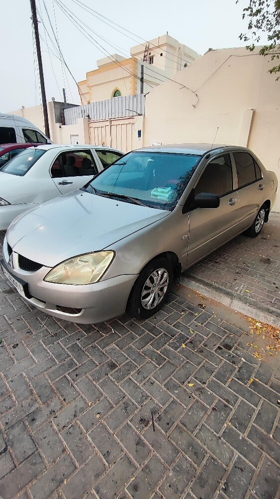 Mitsubishi lancer glx 2006 - 7