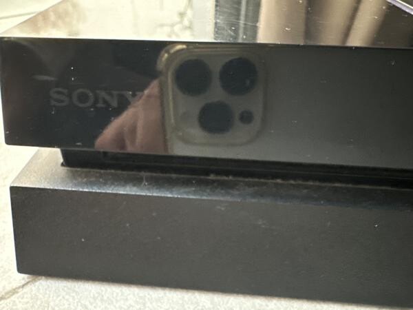 PS4 (1 TB) + 2 controllers & games - 9