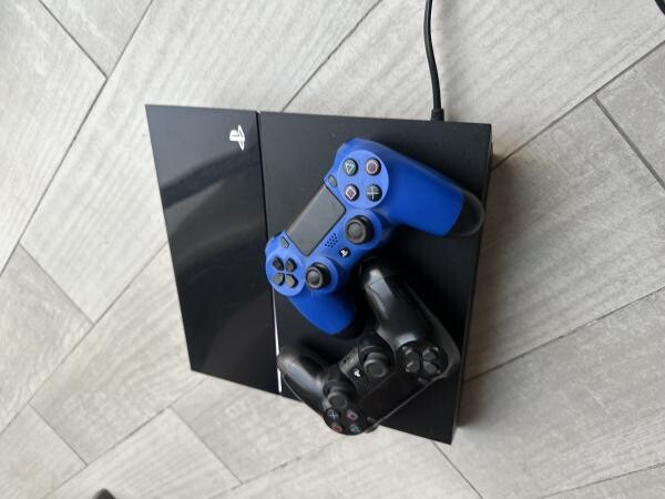 PS4 (1 TB) + 2 controllers & games - 6